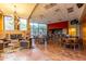 Community room with fireplace, cafe, and comfortable seating areas at 33231 N 72Nd Pl, Scottsdale, AZ 85266
