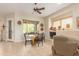 Bright dining area with a wooden table and four chairs, adjacent to the kitchen at 33231 N 72Nd Pl, Scottsdale, AZ 85266