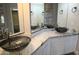 Double vanity bathroom with granite countertop at 27824 N 256Th Ave, Wittmann, AZ 85361