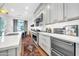 Modern kitchen with gray cabinets and marble countertops at 7240 N 13Th Ln, Phoenix, AZ 85021