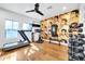 Home gym with state-of-the-art equipment and inspirational wall art at 7240 N 13Th Ln, Phoenix, AZ 85021