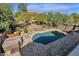 Relaxing pool and spa surrounded by lush landscaping at 15728 E Burro Dr, Fountain Hills, AZ 85268