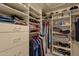 Large walk-in closet with ample shelving and hanging space at 15728 E Burro Dr, Fountain Hills, AZ 85268