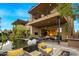 Backyard patio with fire pit and seating area at 37200 N Cave Creek Rd # 1082, Scottsdale, AZ 85262