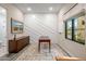 Modern home office features a built-in desk and cabinets at 37200 N Cave Creek Rd # 1082, Scottsdale, AZ 85262