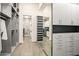 Large walk-in closet with built-ins and laundry room access at 37200 N Cave Creek Rd # 1082, Scottsdale, AZ 85262