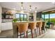 Stylish wet bar with a marble countertop and wine cooler at 37200 N Cave Creek Rd # 1082, Scottsdale, AZ 85262