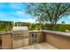 Built-in outdoor grill with refrigerator at 37200 N Cave Creek Rd # 1082, Scottsdale, AZ 85262