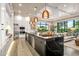 Modern kitchen boasts stainless steel appliances and a large center island at 37200 N Cave Creek Rd # 1082, Scottsdale, AZ 85262