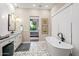 Spa-like bathroom with freestanding tub and double vanity at 37200 N Cave Creek Rd # 1082, Scottsdale, AZ 85262