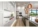 Gourmet kitchen with stainless steel appliances and an expansive island at 37200 N Cave Creek Rd # 1082, Scottsdale, AZ 85262