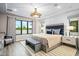 Spacious primary bedroom with a neutral color palette and large window at 37200 N Cave Creek Rd # 1082, Scottsdale, AZ 85262