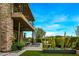 Stunning desert landscaping with a covered patio, creating a relaxing outdoor space at 37200 N Cave Creek Rd # 1082, Scottsdale, AZ 85262