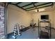 Well-equipped home gym featuring various exercise machines and free weights at 37200 N Cave Creek Rd # 1082, Scottsdale, AZ 85262