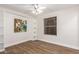 Bedroom with built-in shelves and artwork at 568 N Falcon Dr, Gilbert, AZ 85234
