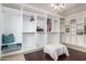 Spacious walk-in closet with hanging rods and shelving at 568 N Falcon Dr, Gilbert, AZ 85234