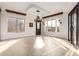 Elegant dining room with a stunning chandelier and patio access at 568 N Falcon Dr, Gilbert, AZ 85234