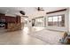 Open kitchen with large island and rich wood cabinetry at 568 N Falcon Dr, Gilbert, AZ 85234