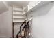Laundry room with shelving and built-in cabinets at 568 N Falcon Dr, Gilbert, AZ 85234