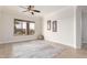 Spacious living area with large windows and tile floors at 568 N Falcon Dr, Gilbert, AZ 85234
