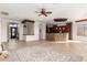 Open floor plan living area with views to the kitchen and entryway at 568 N Falcon Dr, Gilbert, AZ 85234