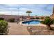 Inviting pool with a brick patio and landscaping at 568 N Falcon Dr, Gilbert, AZ 85234