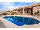 Refreshing kidney-shaped pool with concrete decking at 568 N Falcon Dr, Gilbert, AZ 85234