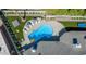 Aerial view of backyard oasis, including pool and entertaining areas at 6908 E Mariposa Dr, Scottsdale, AZ 85251