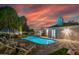 Backyard retreat with a pool, lounge chairs, and sunset views at 6908 E Mariposa Dr, Scottsdale, AZ 85251