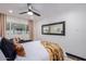 Bright bedroom with a large mirror and comfortable bedding at 6908 E Mariposa Dr, Scottsdale, AZ 85251