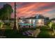 Expansive backyard with pool, chessboard, and sunset views at 6908 E Mariposa Dr, Scottsdale, AZ 85251