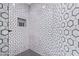 Hexagon-tiled shower with built-in niche at 6908 E Mariposa Dr, Scottsdale, AZ 85251