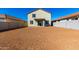 Large backyard with block wall and new home at 7499 E Sweet Honey Ln, San Tan Valley, AZ 85143