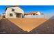 Large backyard with block wall and new home at 7499 E Sweet Honey Ln, San Tan Valley, AZ 85143