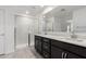 Bathroom boasts double vanity and a large walk-in shower at 7499 E Sweet Honey Ln, San Tan Valley, AZ 85143