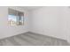 Bright bedroom with carpet flooring and a window offering natural light at 7499 E Sweet Honey Ln, San Tan Valley, AZ 85143