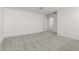 Spacious bedroom with carpet flooring and a door to hallway at 7499 E Sweet Honey Ln, San Tan Valley, AZ 85143