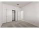 Bedroom with double door closet and carpet flooring at 7499 E Sweet Honey Ln, San Tan Valley, AZ 85143