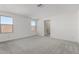 Spacious bedroom with carpet flooring and ensuite bathroom access at 7499 E Sweet Honey Ln, San Tan Valley, AZ 85143