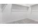 Large walk-in closet with double hanging rods at 7499 E Sweet Honey Ln, San Tan Valley, AZ 85143