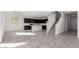 Modern kitchen with dark cabinets and an island at 7499 E Sweet Honey Ln, San Tan Valley, AZ 85143