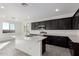 Spacious kitchen with island and stainless steel appliances at 7499 E Sweet Honey Ln, San Tan Valley, AZ 85143