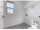 Laundry room with tile flooring and shelving at 7499 E Sweet Honey Ln, San Tan Valley, AZ 85143