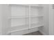 Empty pantry with white shelves at 7499 E Sweet Honey Ln, San Tan Valley, AZ 85143