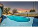 Relaxing kidney-shaped pool, perfect for summer days at 7637 N 46Th Dr, Glendale, AZ 85301