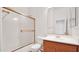 Small bathroom with shower/tub combo and wood vanity at 2425 W Red Range Way, Phoenix, AZ 85085