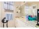 Clean bathroom with double vanity and shower bathtub at 10014 N 66Th Ln, Glendale, AZ 85302