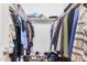 Spacious walk-in closet with ample hanging space at 10014 N 66Th Ln, Glendale, AZ 85302