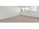 Spacious bedroom featuring a large window with city view at 353 E Thomas Rd # C405, Phoenix, AZ 85012