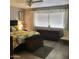Comfortable bedroom with a king bed and window with blinds at 272 Leisure World --, Mesa, AZ 85206